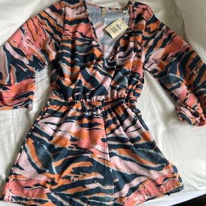 Cute beach romper brand new!